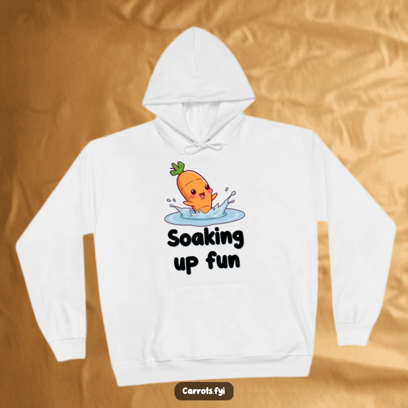 Funny hoodie featuring a delighted carrot character mid-splash in a water puddle, embodying pure, uninhibited fun.